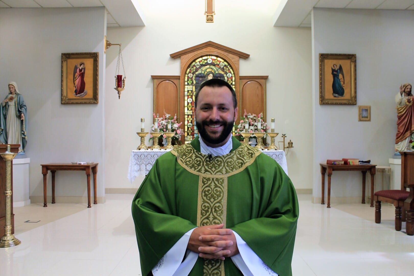 Newman graduate returns as chaplain